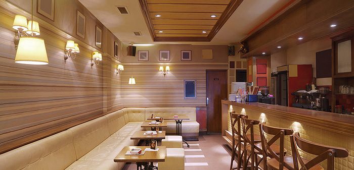 A restaurant with wooden walls and tables
