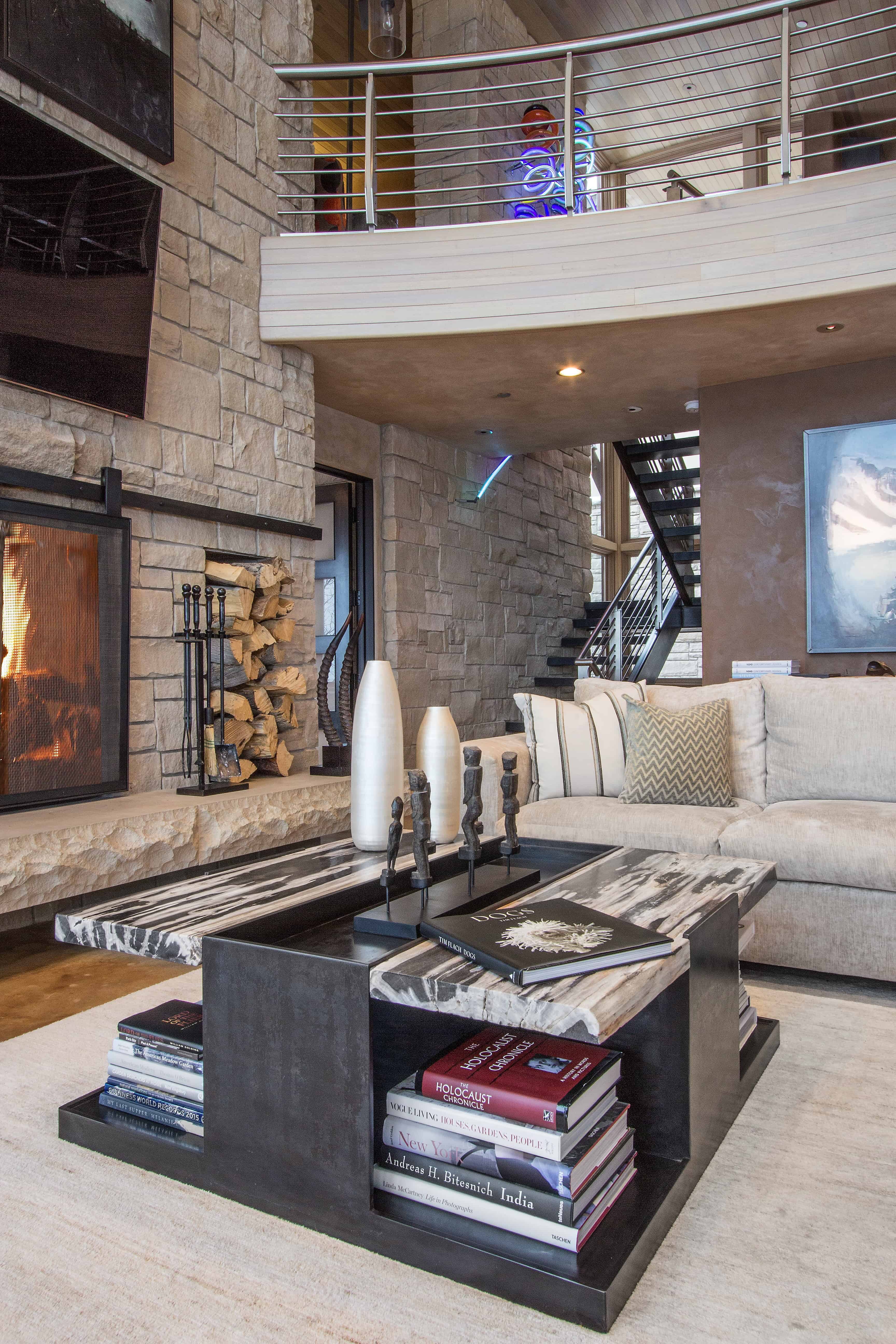 A living room with a fireplace and a couch